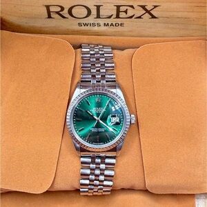 Rolex Silver and Green Watch